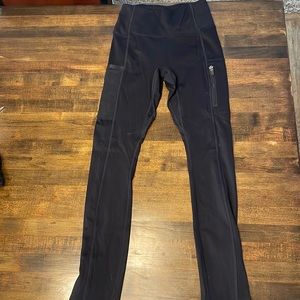 Black XS fabletics leggings with zipper detailings
